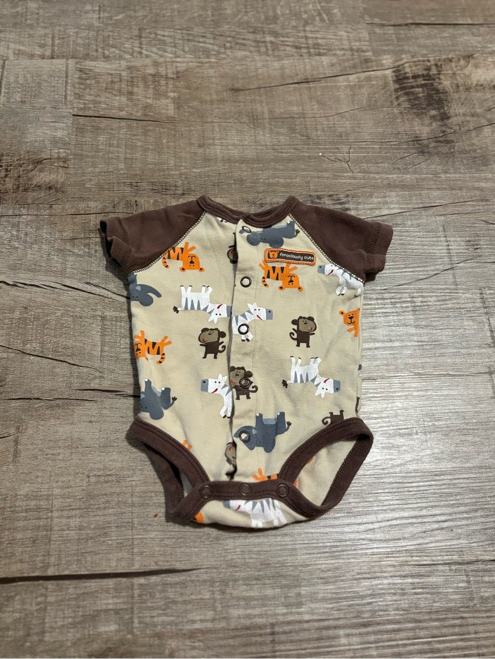 Animal Print Baby One-Piece with Brown Trim